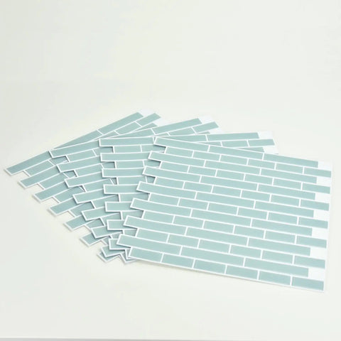 Sea Glass Peel And Stick Backsplash Tiles Blue 10.5 Inch By 10.5 Inch Four Panels neatly stacked on white surface.
