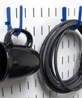 Blue Slotted Metal Pegboard Hook Kit For Storage And Organization Deluxe Assortment 50 Lbs Capacity Made In USA Durable Toolboard Hooks That Rock Rust Resistant For Long Lasting Use, black mug and coiled cable hanging on hooks