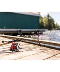 Dock Runner Spinning Reel And Fishing Rod Combo 36 Inch Medium Action on dock, cork and EVA grips, pre-spooled 6 lb line