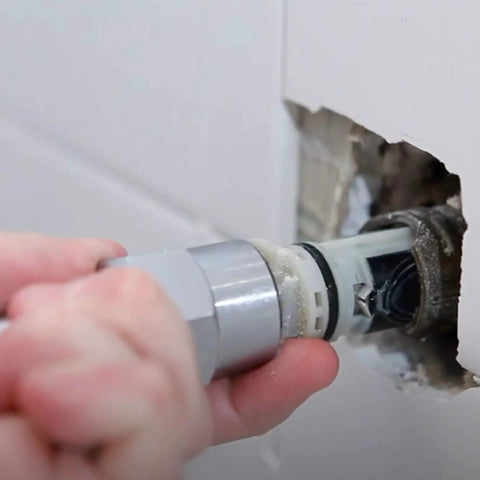 Cartridge Puller Tool For Posi Temp Tub And Shower Cartridges 1200 1222 1225 Pro Grade Removal Accessory in use on shower wall