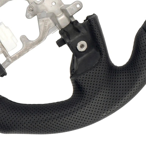 Close-up of Toyota Tacoma 2016 2023 Heated Perforated Leather Steering Wheel Replacement Kit, Premium Microfiber Leather