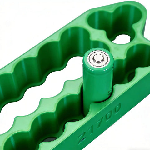 Slick Heavy Duty Spot Welding Jig For 18650 And 21700 Battery Packs in green, securely holding a 21700 cell with safe grip.