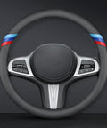 BMW Nappa Leather Steering Wheel Cover Slim Fit With Three Color Stripe Design, shown installed on a steering wheel.