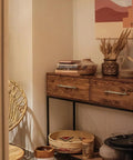 Living room with cabinet featuring Vintage Retro Antique Brass Zinc Alloy Cabinet Handles 6 Pack, decorated with books and plants.