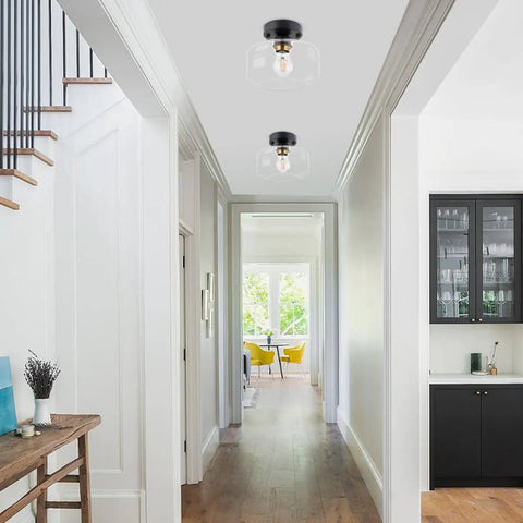 Semi Flush Mount Ceiling Light With Matte Black Finish And 8.66 Inch Clear Hand Blown Glass Shade in modern hallway