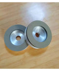 High Efficiency CBN Grinding Wheel For Metalwork With 100mm Diameter, 20mm Thick, 20mm Bore on wooden background