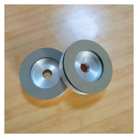 High Efficiency CBN Grinding Wheel For Metalwork With 100mm Diameter, 20mm Thick, 20mm Bore on wooden background