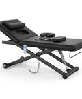 Dolonm Heavy Duty Electric Massage Table With Adjustable Lift And Backrest, black cushioned platform and remote control.