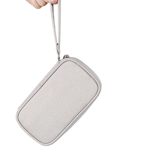 Portable Double Layer Electronic Organizer Travel Case in hand, water resistant storage pouch for chargers and gadgets.