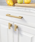 Ten Pack Brushed Gold Cabinet Knobs 2 Inch 50mm Single Hole Pulls For Kitchen Cabinets And Drawer Fronts ZH0026 installed on white cabinets