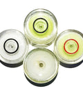 Close-up of 50PCS Plastic Circular Round Bubble Level Universal Bullseye Spirit Level in different colors.