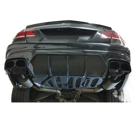 Rear view of Mercedes W212 E63 E63S Carbon Fiber Front And Rear Diffuser Lip Kit With Exhaust Tips Direct Fit No Drilling