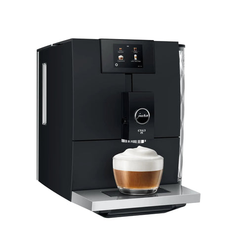 Smooth Operator Fully Automatic Coffee Machine Featuring A Smart Touchscreen And One Touch Milk Drinks In Polished Metropolitan Black, with coffee and milk froth.