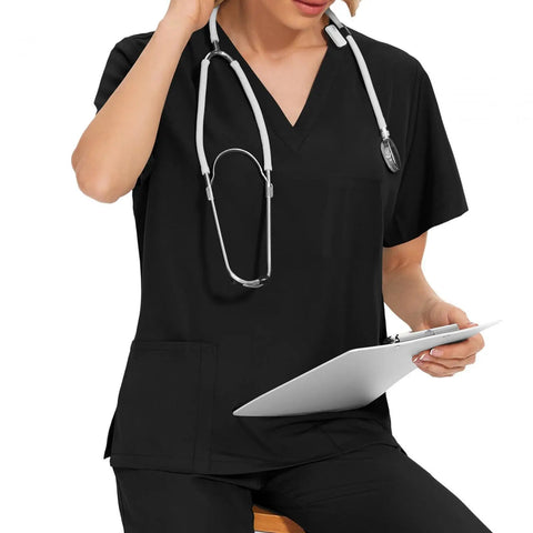 Woman wearing Women's Scrubs Set Top and Jogger Pants for Spa Beauty Workwear, Machine Washable Nurse Uniform, Black, XXL, holding clipboard.