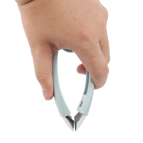 Hand holding V Shape Fruit Core Remover And Strawberry Huller Stainless Steel Kitchen Gadget With Ergonomic Non Slip Handle Auto Rebound Spring For Pineapple, Apple And Veggie Slicing Blue