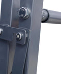 Close-up of metal bolts and brackets on the Wall Mount Folding Tire Rack With Adjustable Width And Heavy Duty 300 Lb Capacity For Rv Atv Car Storage.