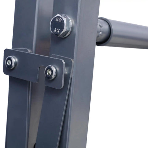 Close-up of metal bolts and brackets on the Wall Mount Folding Tire Rack With Adjustable Width And Heavy Duty 300 Lb Capacity For Rv Atv Car Storage.