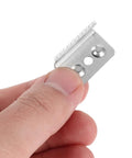 Stainless Steel Serrated Tape Dispenser Blades Replacement Knife For Packaging Box Sealer Pro Grade Heavy Duty Cutter shown in hand