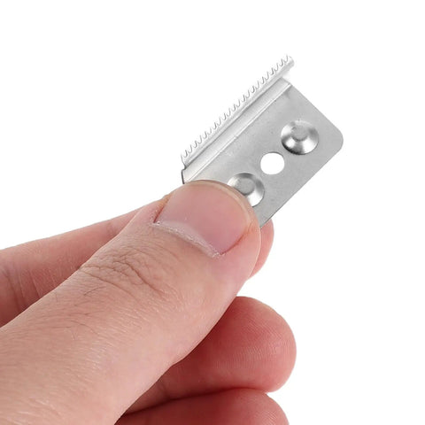 Stainless Steel Serrated Tape Dispenser Blades Replacement Knife For Packaging Box Sealer Pro Grade Heavy Duty Cutter shown in hand