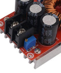 Close-up view of the Beefy 1200W 20A DC-DC Boost Converter for Cars, showing capacitors and adjustable components.