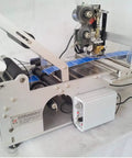 High Speed Round Bottle Labeling Machine Plus Slick Date Printer for beverage containers up to 150 mm wide, silver metal design.