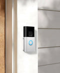 No Drill Ring Doorbell Mount For Renters Adhesive Stick On Solution installed on white doorframe.