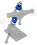Premium American Longboard And Skateboard Truck Replacement Bushings 4 Pack Soft 88a Blue Cushions installed on a skateboard truck.