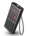 Pocket Mini FM Radio And MP3 Player With USB TF Card Support, showing buttons and digital display, Walkman style wristband visible.