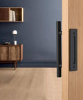 Two Pack 12 Inch Sliding Barn Door Handle Pull And Flush Hardware Set With Flat Back Plate Design In Rustic Black Finish, installed