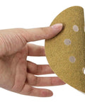 5 inch hook and loop sanding disc being held, featuring aluminum oxide grit for orbital sander projects.
