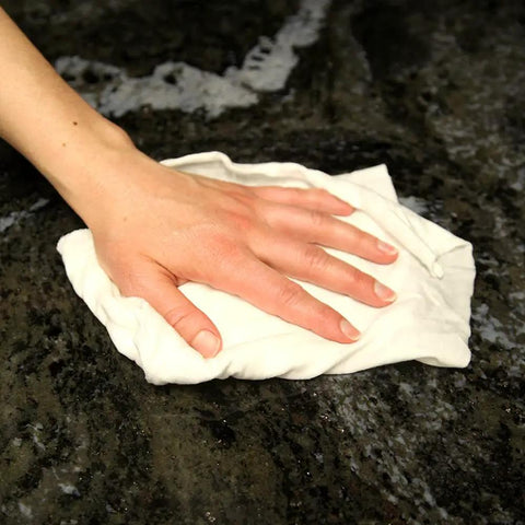 Hand using All Purpose White T Shirt Rags Pack 4 Lb Box Bleached Cotton Rags For Painting Staining Polishing And More Super Absorbent Reusable And Machine Washable 128 Fl Oz