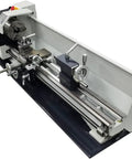 QYLTTDM 900W Mini Metal Lathe Machine, Precision Benchtop Lathe showing tools and chuck for DIY enthusiasts.