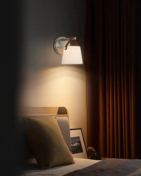 Battery Operated Wall Sconce With Glass Shade, 3000K Warm White in bedroom with bed, no wiring needed, nickel finish shown