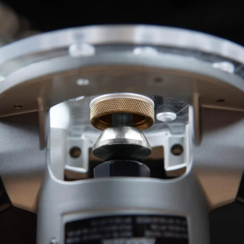 Close-up of Professional Router Subbase Centering Pin And Cone Set for precise collet alignment in woodworking.