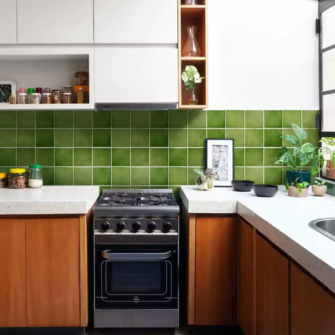 Green 3D Peel And Stick Tile Backsplash Squares 11.8x11.8 Inches Ultralight PVC installed in modern kitchen setting.
