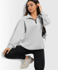Model wearing Oversized Womens Hoodie Sweatshirt Quarter Zip Pullover For Fall And Winter With Soft Fleece Lining Long Sleeve Grey
