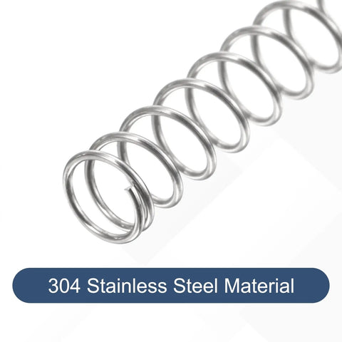 Close-up of 50 Pcs 304 Stainless Steel Compression Springs, 0.4mm wire dia, 4mm OD, 15mm free length, silver tone, rust resistant