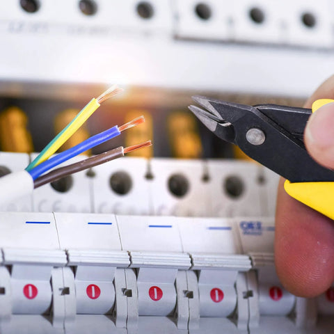 HongWay 5-inch micro flush cutter with yellow handle cutting copper wires near a circuit breaker panel