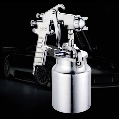 Professional Grade Hvlp Paint Sprayer Pneumatic Suction Feed Gun with stainless steel finish and adjustable air valve.
