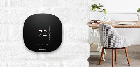 3 Lite Wi Fi Thermostat With Alexa Voice Control For Hands Free Comfort on white brick wall in modern office