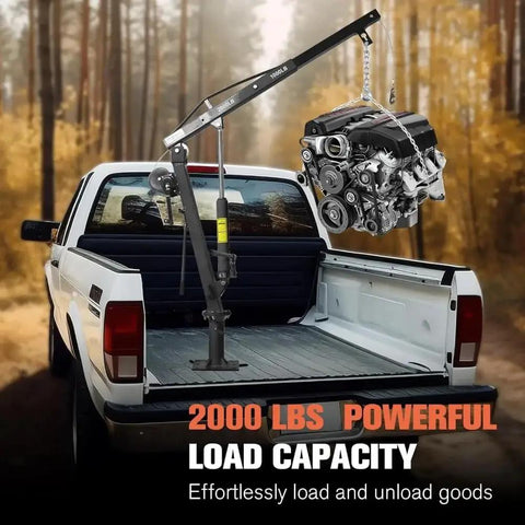 Built Tough Heavy Duty Folding Engine Hoist And Pickup Bed Tailgate Crane With Slick Hydraulic Winch lifting a 2000 lbs engine in a truck.
