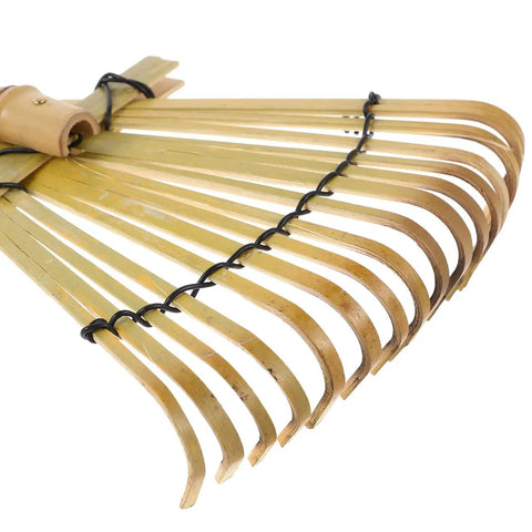 Close-up of the Solid Bamboo Garden Rake for Sandboxes and Landscaping showing bamboo tines and natural light color.