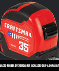 35-Foot Tape Measure For Solo Jobs, 14-Foot Reach, Extra Wide Blade, Large Readable Numbers, Durable Hook, Made In USA, Built Tough For One Person Measuring On The Job Site, red casing, close-up view.