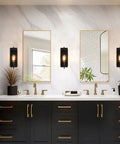 Black Wall Sconce Lighting Single Light Bathroom Vanity Fixture In Modern Farmhouse Style Slick Matte Black Metal Wall Light With E26 Base 110 To 240V Durable Indoor Bathroom Hallway Accent in stylish bathroom setting with mirrors and plants.