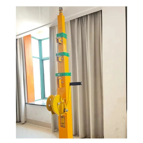 Heavy Duty 9 Meter Manual Winch Telescopic Mast With A Sturdy 70kg Load Rating For Off Grid Satellite Antennas and Remote Comms Arrays, yellow frame with hand crank.