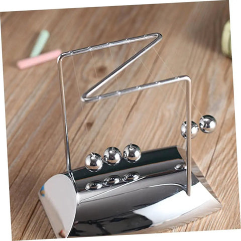 Z Shape Newton Cradle Pendulum Desk Toy For Home Office Decor, silver 5-ball model on wooden desk