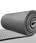 Kickass Soundproof Foam Panels For Walls Hella Effective Noise Cancelling Acoustic Pads Self Adhesive Gym Padding Black 2Cm Thick rolled foam showing texture for sound absorption.