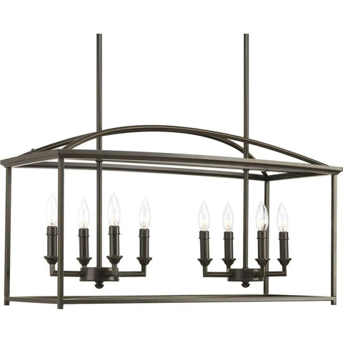 Piedmont Collection Eight Light Farmhouse Chandelier In Antique Bronze With Open Cage Frame Soaring Arches Candle Chaser Accents Classic Shaker Style Vibe Rustic Dining Room Lighting Fixture