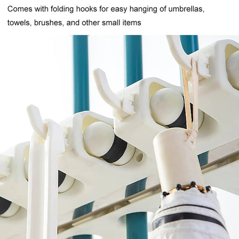 Close-up of Heavy Duty Stainless Steel Broom And Mop Organizer Cart with folding hooks for umbrellas and small items.