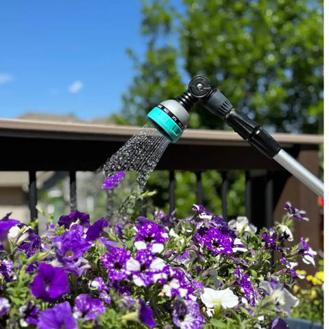 All In One Garden Hose Wand With 180 Degree Swivel Head And 10 Adjustable Spray Patterns watering purple flowers
